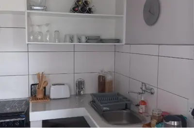 a kitchen with a sink and a counter top at Goldeneye Private Venue Spectre in Raithby