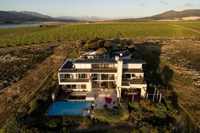 an aerial view of a house in a vineyard at Benguela Cove - Oceans Away in Hermanus