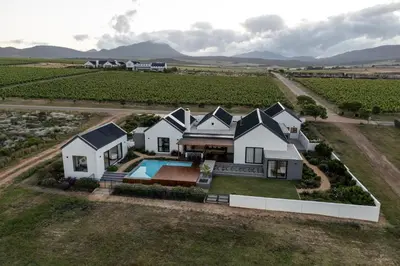 an aerial view of a house in a vineyard at Benguela Cove - Utopia in Hermanus