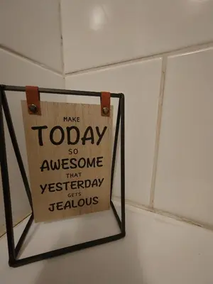 a sign hanging on the ceiling of a room at La Damon 1 in Paarl