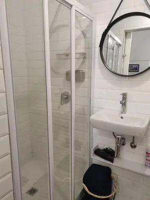 a bathroom with a shower and a sink at La Damon 2 in Paarl