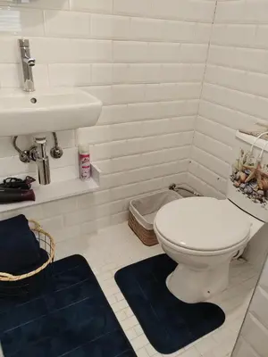 a bathroom with a toilet and a sink at La Damon 2 in Paarl