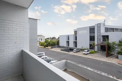 a view from the balcony of a building at Rest on Millvale guest house in Cape Town
