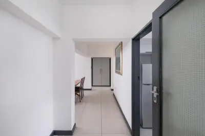 an empty hallway with a door and a hallway sidx sidx sidx at Rest on Millvale guest house in Cape Town
