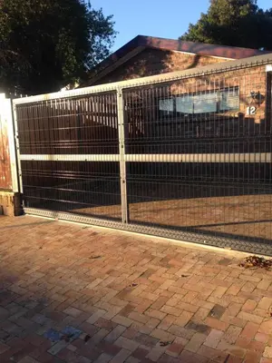 a metal fence in front of a house at Aan de weg in Cape Town