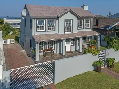 an aerial view of a house with a white fence at 3-Bed-Mountain View in Hermanus